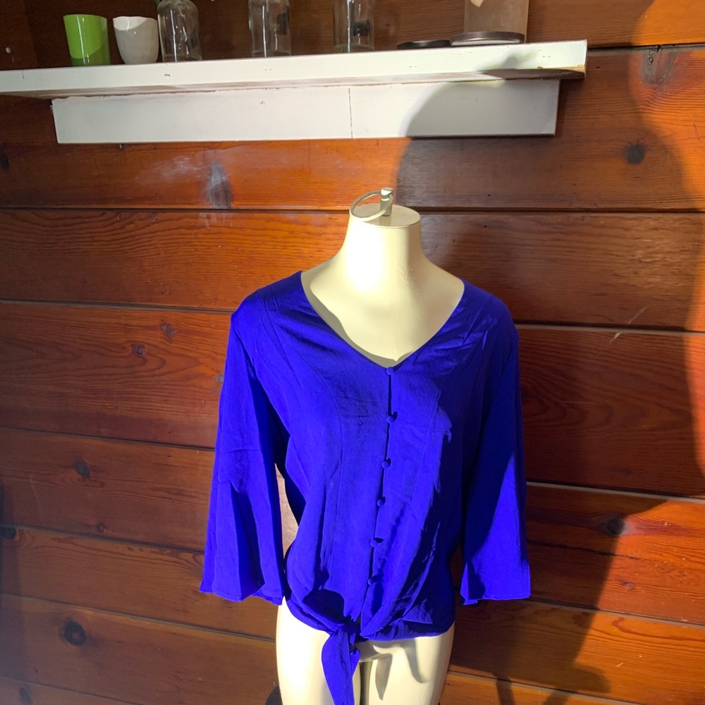 Button up tie at the bottom royal blue blouse. XL